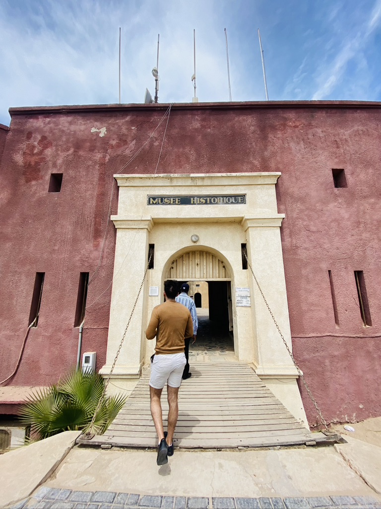 entering a museum at ile goree in senegal 